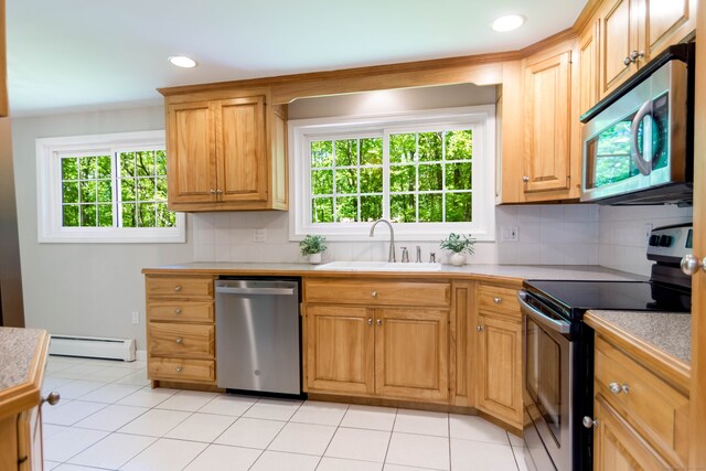 4 Leopard Dr, Newtown, CT 06482 - kitchen featuring stainless steel appliances, a sink, healthy amount of natural light, light countertops, and recessed lighting