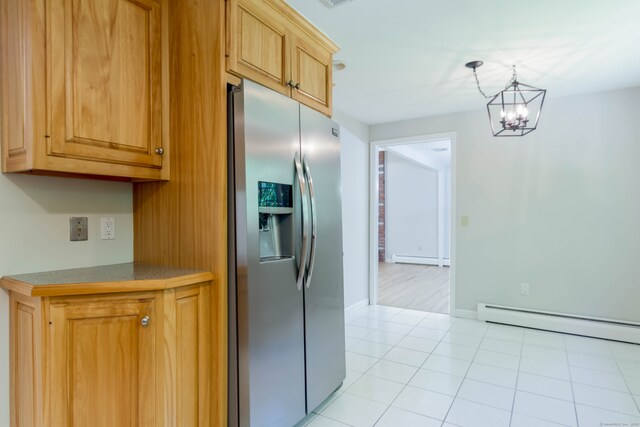4 Leopard Dr, Newtown, CT 06482 - kitchen featuring stainless steel fridge, a baseboard radiator, a baseboard heating unit, a chandelier, and baseboards