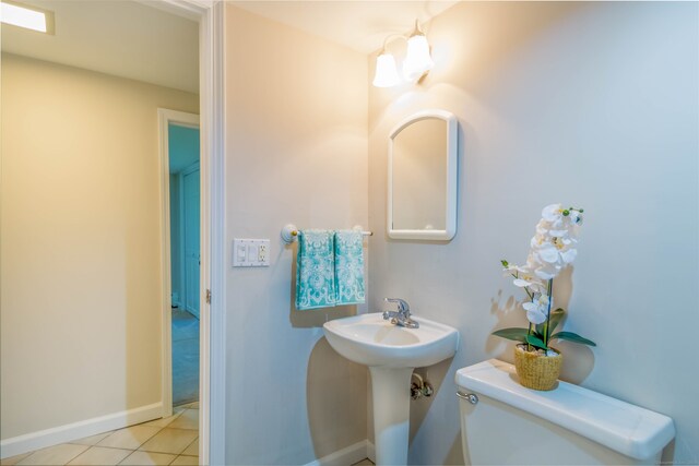 4 Leopard Dr, Newtown, CT 06482 - half bath featuring toilet, baseboards, and tile patterned floors