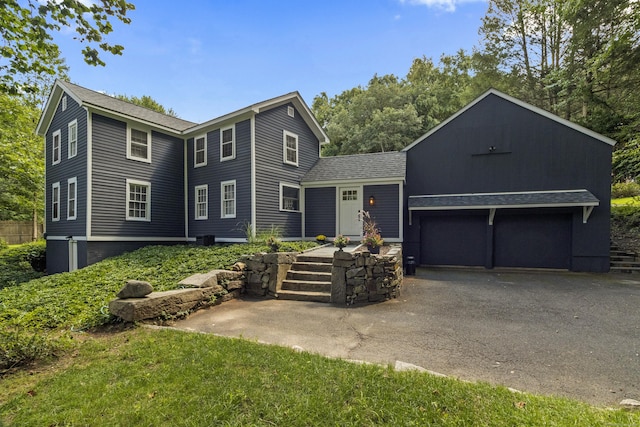 94 Glen Rd, Newtown, CT 06482 - colonial-style house featuring asphalt driveway, roof with shingles, and an attached garage