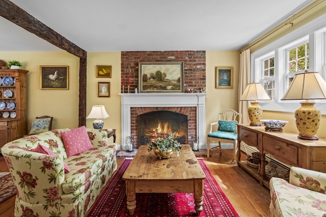 94 Glen Rd, Newtown, CT 06482 - living area featuring wood-type flooring and a brick fireplace