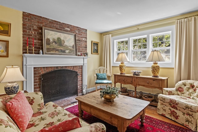 94 Glen Rd, Newtown, CT 06482 - living area featuring a brick fireplace and wood finished floors