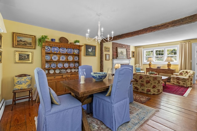 94 Glen Rd, Newtown, CT 06482 - dining area with a chandelier, beamed ceiling, wood-type flooring, and baseboard heating