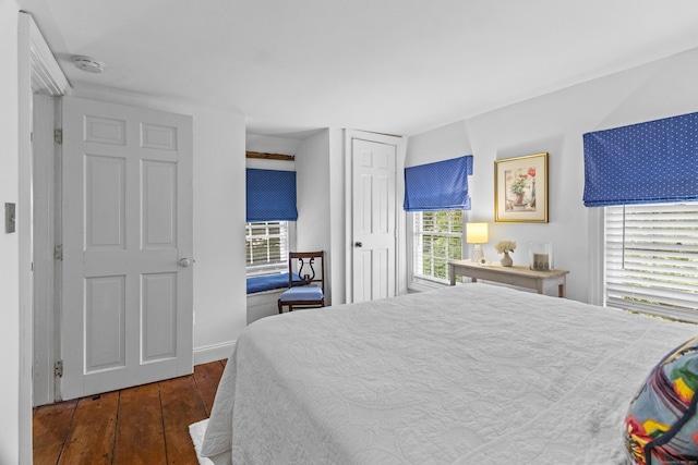 94 Glen Rd, Newtown, CT 06482 - bedroom with multiple windows, hardwood / wood-style floors, baseboards, and a closet