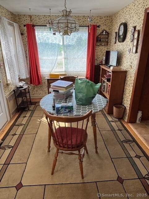 78 Pleasant View Rd, Thomaston, CT 06787 - dining room with wallpapered walls, a chandelier, and light tile patterned floors