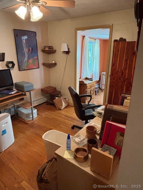 78 Pleasant View Rd, Thomaston, CT 06787 - office area with ceiling fan, wood finished floors, and radiator heating unit