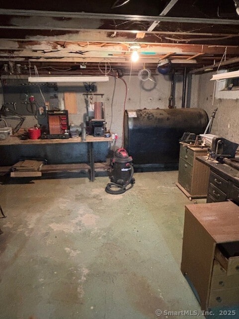 78 Pleasant View Rd, Thomaston, CT 06787 - unfinished below grade area featuring heating fuel and a workshop area