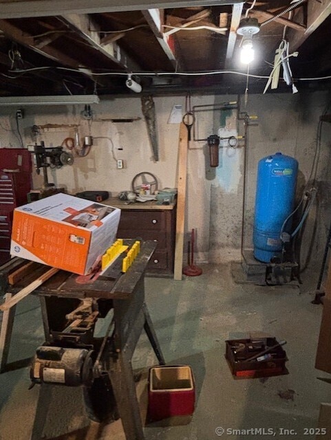 78 Pleasant View Rd, Thomaston, CT 06787 - unfinished below grade area with a water pressure tank