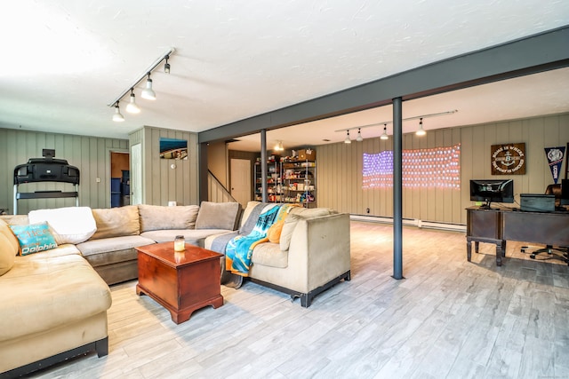 7 Broadview Rd, Brookfield, CT 06804 - living room with rail lighting, wood finished floors, and baseboard heating