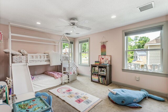 22 Lake Shore Dr, Middlefield, CT 06455 - bedroom with multiple windows, carpet, baseboards, recessed lighting, and ceiling fan
