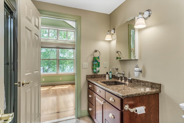 22 Lake Shore Dr, Middlefield, CT 06455 - bathroom with plenty of natural light, vanity, and baseboards