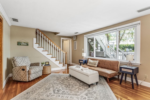 22 Lake Shore Dr, Middlefield, CT 06455 - living room featuring stairway, wood finished floors, and baseboards