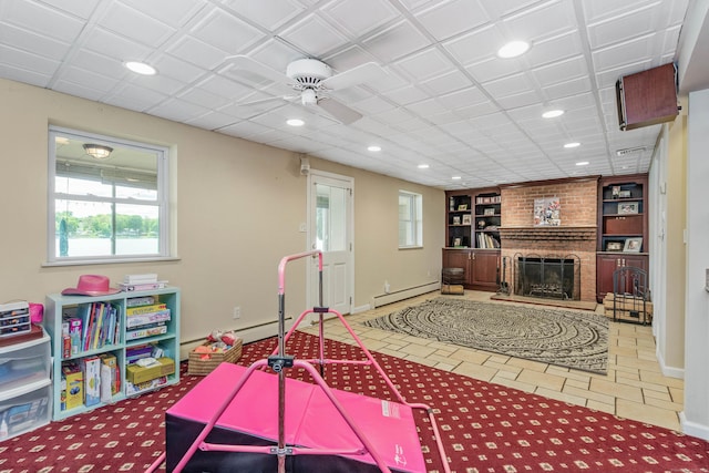 22 Lake Shore Dr, Middlefield, CT 06455 - recreation room with a baseboard radiator, recessed lighting, ceiling fan, built in features, and baseboards