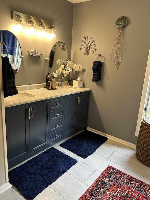 310 Weatherly Trl, Guilford, CT 06437 - full bath with double vanity and baseboards