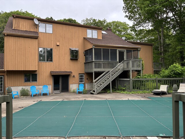 310 Weatherly Trl, Guilford, CT 06437 - view of sport court featuring a covered pool and stairway