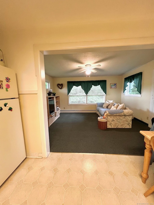 13 Oak St, Wolcott, CT 06716 - living area featuring carpet floors, baseboard heating, and ceiling fan