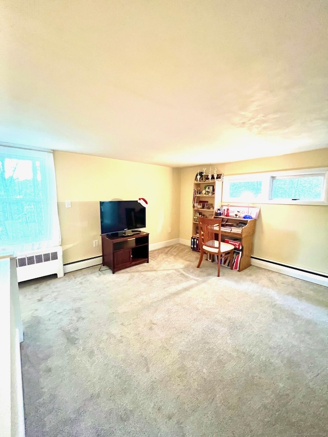 13 Oak St, Wolcott, CT 06716 - carpeted living room with radiator heating unit, a baseboard radiator, and baseboards