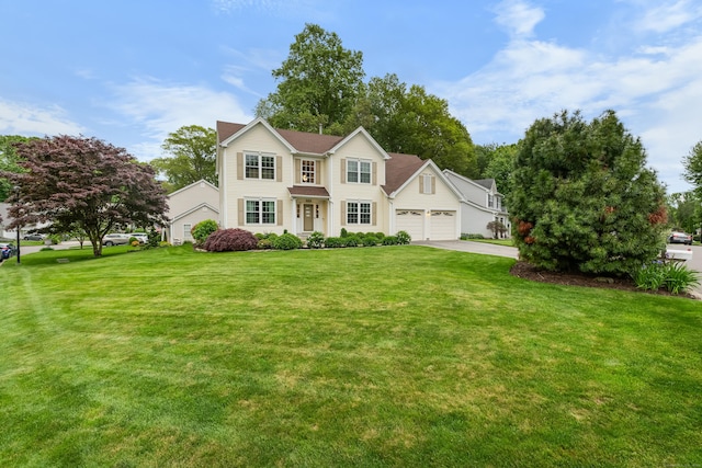 55 Oak Ridge Ln, Milford, CT 06461 - traditional home featuring concrete driveway, a front lawn, and an attached garage