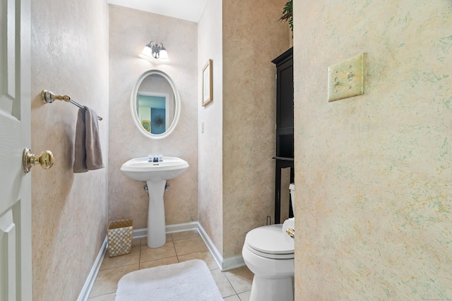 55 Oak Ridge Ln, Milford, CT 06461 - bathroom with tile patterned flooring, toilet, and baseboards