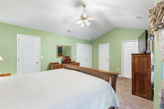 55 Oak Ridge Ln, Milford, CT 06461 - bedroom featuring carpet floors, vaulted ceiling, ceiling fan, and multiple closets