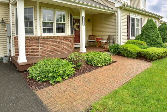 63 Hudson Ln Unit 63, Windsor, CT 06095 - doorway to property featuring a porch and brick siding