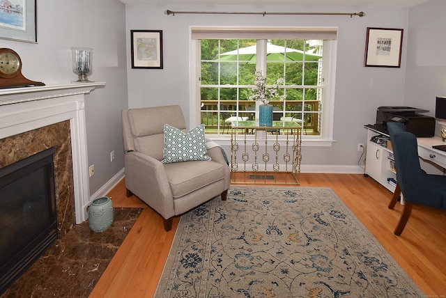 63 Hudson Ln Unit 63, Windsor, CT 06095 - office area with wood finished floors, a fireplace, and baseboards
