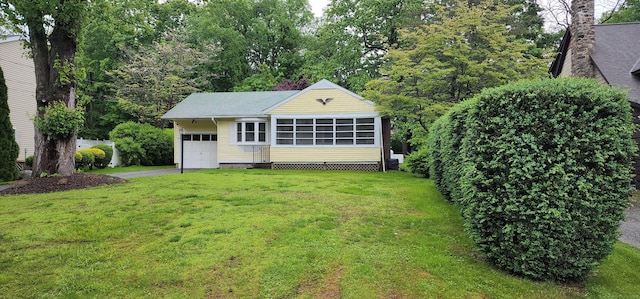 71 Sherry Ln, New Milford, CT 06776 - view of front of property with driveway, a garage, a front lawn, and a sunroom