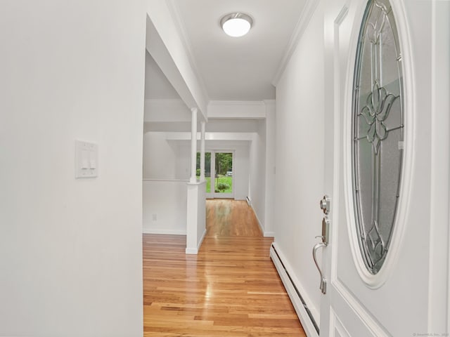 56 Great Neck Rd, Trumbull, CT 06611 - foyer with baseboard heating, light wood-style floors, ornamental molding, and baseboards