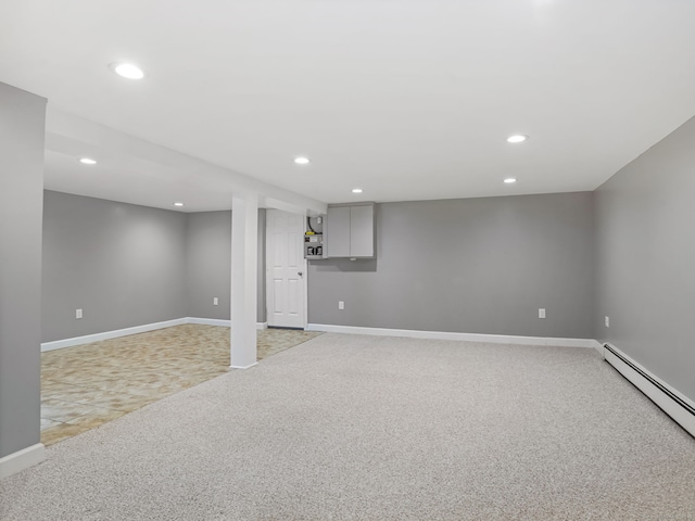 56 Great Neck Rd, Trumbull, CT 06611 - finished basement with baseboard heating, recessed lighting, light colored carpet, and baseboards