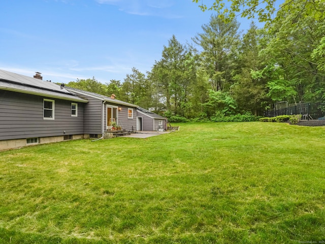 56 Great Neck Rd, Trumbull, CT 06611 - view of green lawn featuring a patio area