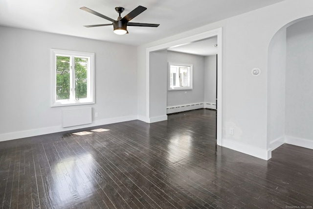 184 Merritt St, Bridgeport, CT 06606 - unfurnished room featuring a baseboard radiator, arched walkways, a ceiling fan, and healthy amount of natural light