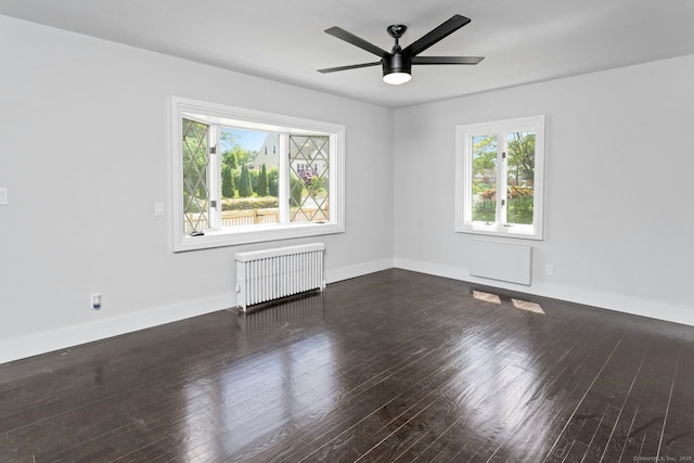 184 Merritt St, Bridgeport, CT 06606 - unfurnished room featuring radiator heating unit, hardwood / wood-style flooring, a ceiling fan, and baseboards