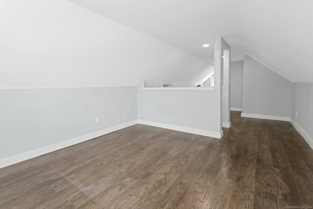 184 Merritt St, Bridgeport, CT 06606 - additional living space with lofted ceiling, wood finished floors, and baseboards