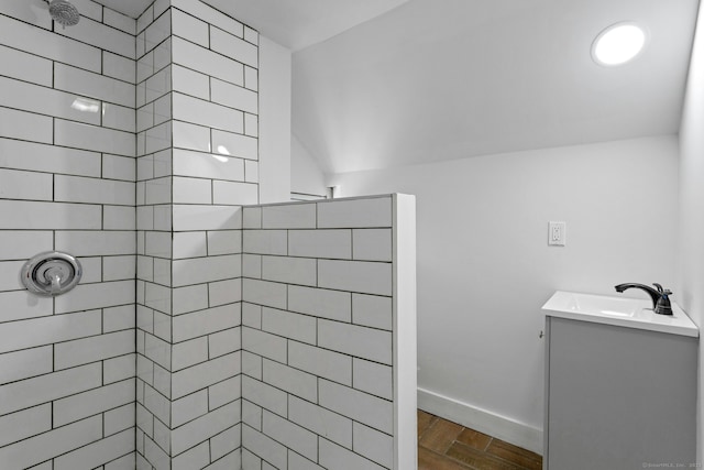 184 Merritt St, Bridgeport, CT 06606 - bathroom featuring tiled shower, baseboards, and vanity
