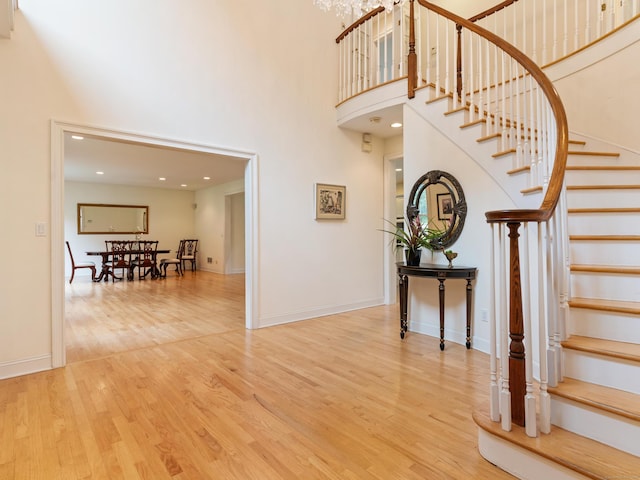 9 Autumn Leaves Rd, Wallingford, CT 06492 - stairway featuring a towering ceiling and wood finished floors