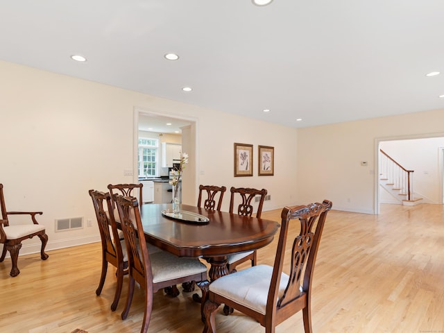 9 Autumn Leaves Rd, Wallingford, CT 06492 - dining space with light wood finished floors, recessed lighting, and stairway