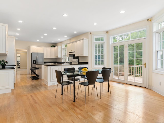 9 Autumn Leaves Rd, Wallingford, CT 06492 - dining room with light wood-style floors and recessed lighting