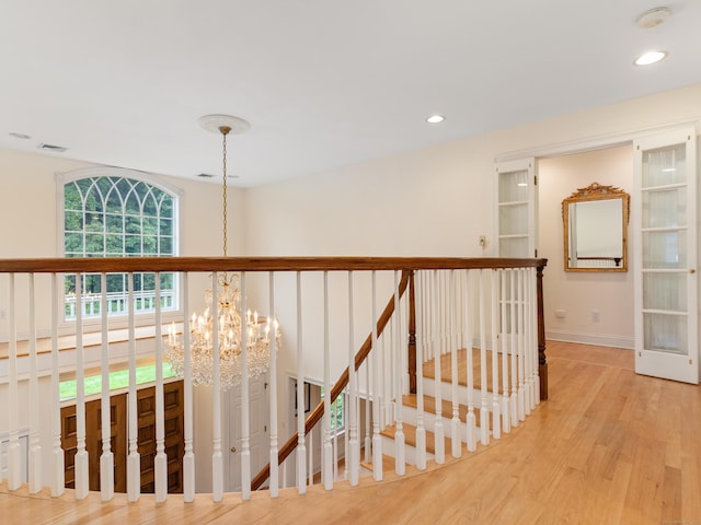 9 Autumn Leaves Rd, Wallingford, CT 06492 - corridor featuring a chandelier, light wood-type flooring, and recessed lighting