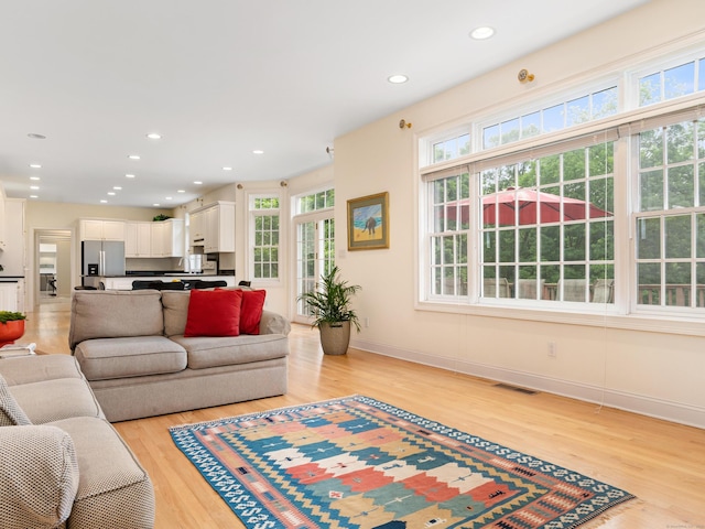 9 Autumn Leaves Rd, Wallingford, CT 06492 - living area with light wood-type flooring and recessed lighting
