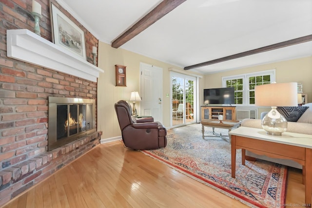 33 Raven Rd, Trumbull, CT 06611 - living area featuring a fireplace, beamed ceiling, hardwood / wood-style flooring, and ornamental molding
