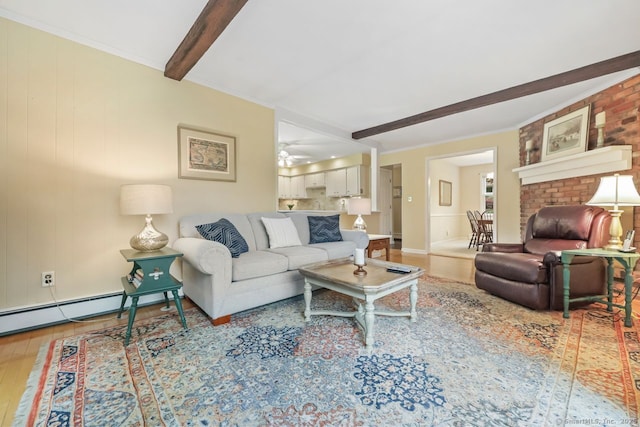 33 Raven Rd, Trumbull, CT 06611 - living area with wood finished floors, beam ceiling, a fireplace, and a ceiling fan