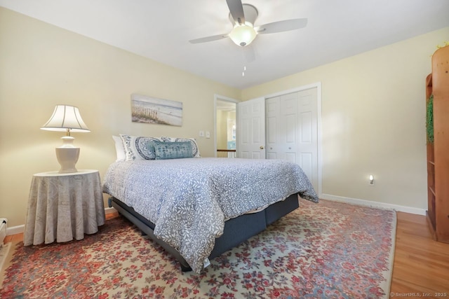 33 Raven Rd, Trumbull, CT 06611 - bedroom with baseboards, wood finished floors, a closet, and a ceiling fan