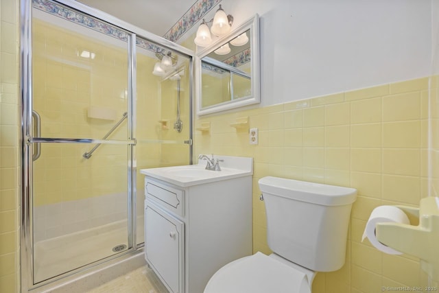 33 Raven Rd, Trumbull, CT 06611 - bathroom with toilet, a shower stall, vanity, and tile walls