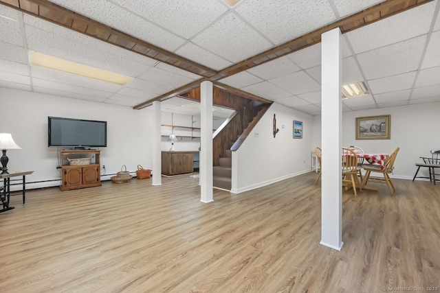 33 Raven Rd, Trumbull, CT 06611 - living area featuring a drop ceiling, wood finished floors, stairs, and baseboards