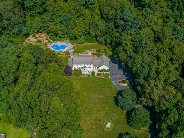 607 Tolland Stage Rd, Tolland, CT 06084 - view of property location with a heavily wooded area and a pool