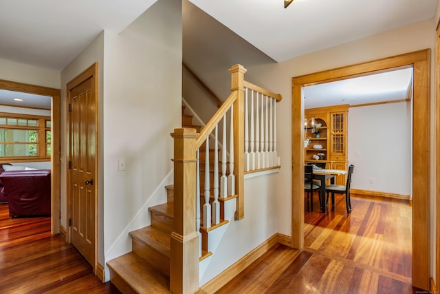 607 Tolland Stage Rd, Tolland, CT 06084 - stairs with wood finished floors and baseboards
