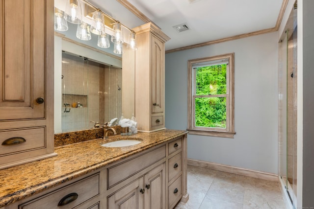 607 Tolland Stage Rd, Tolland, CT 06084 - full bathroom featuring vanity, a shower stall, crown molding, baseboards, and tile patterned floors
