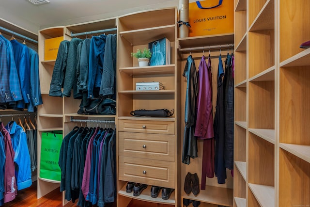 607 Tolland Stage Rd, Tolland, CT 06084 - spacious closet featuring wood finished floors