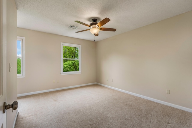 607 Tolland Stage Rd, Tolland, CT 06084 - carpeted empty room featuring ceiling fan, baseboards, and a textured ceiling
