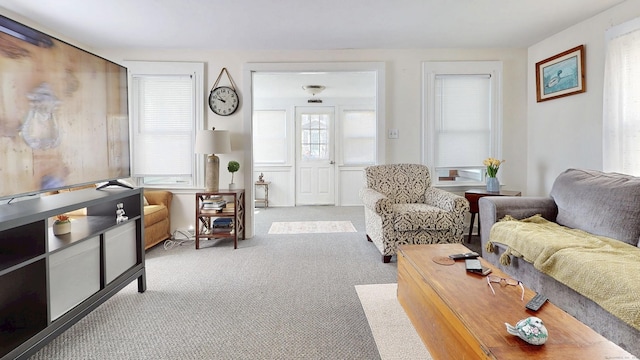 32 Lawrence Ave, Milford, CT 06460 - living room featuring carpet flooring and plenty of natural light